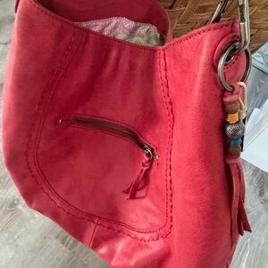 Elegant Red Hobo Bag with Tassel Detail
